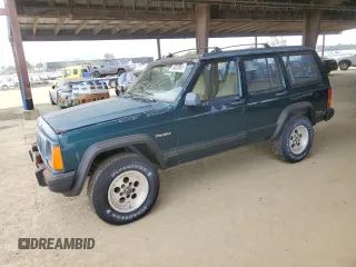 1995 Jeep Cherokee SE with VIN 1J4FJ28S8SL607915, listed as a Copart auction lot 50209055 with 130,023 mi miles and Salvage title. Bid and sale history available at DreamBid. Image 1.