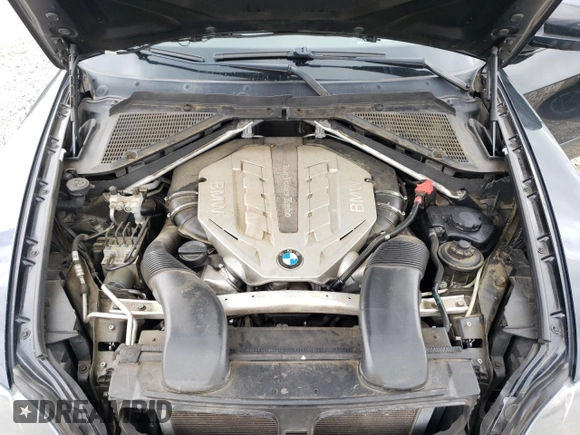 2011 BMW X5 50i with VIN 5UXZV8C52BL419028, listed as a Copart auction lot 59870505 with 126,666 mi miles and Salvage title. Bid and sale history available at DreamBid. Image 12.