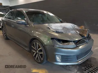 2012 Volkswagen Jetta GLI Autobahn with VIN 3VW5A7AJ9CM403220, listed as a IAAI auction lot 42110111 with 139,382 mi miles and . Bid and sale history available at DreamBid. Image 1.