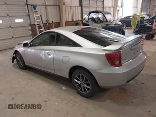 2003 Toyota Celica GT with VIN JTDDR32T330161995, listed as a IAAI auction lot 41437754 with 150,727 mi miles. Bid and sale history available at carsss.com. Image 3.
