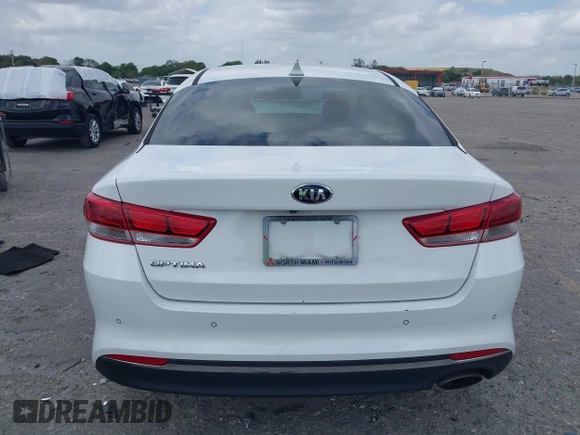 2018 Kia Optima LX with VIN 5XXGT4L34JG253597, listed as a IAAI auction lot 41915762 with 166,521 mi miles. Bid and sale history available at carsss.com. Image 16.