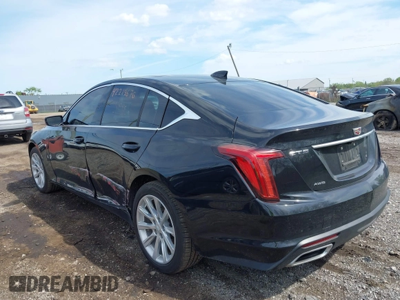 2021 Cadillac CT5 Luxury z VIN 1G6DX5RKXM0146235, wystawiony jako IAAI lot #42214676 z przebiegiem 72 847 mil mil oraz . Historia ofert i sprzedaży dostępna na DreamBid. Obrazek 3.