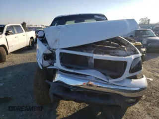 2003 Ford F-150 XLT with VIN 1FTRW08693KC51672, listed as a Copart auction lot 41368805 with 150,614 mi miles and Salvage Title. Bid and sale history available at carsss.com. Image 5.