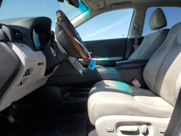 2010 Lexus RX 450h with VIN JTJBC1BA3A2014134, listed as a Copart auction lot 56025275 with 130,471 mi miles and Salvage title. Bid and sale history available at DreamBid. Image 7.