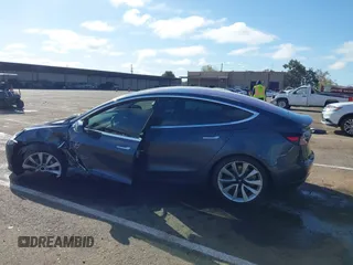 2018 Tesla Model 3 Long Range Battery with VIN 5YJ3E1EA4JF006036, listed as a IAAI auction lot 41934680 with 115,649 mi miles and . Bid and sale history available at DreamBid. Image 13.