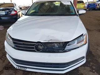 2017 Volkswagen Jetta SEL z VIN 3VWL17AJ3HM406760, wystawiony jako IAAI lot #42002426 z przebiegiem 152 890 mil mil oraz . Historia ofert i sprzedaży dostępna na DreamBid. Obrazek 6.