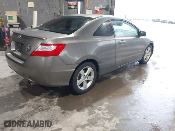 2008 Honda Civic Cpe EX with VIN 2HGFG12878H559388, listed as a IAAI auction lot 42184557 with 164,412 mi miles. Bid and sale history available at carsss.com. Image 3.