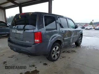 2015 Honda Pilot EX-L with VIN 5FNYF4H50FB030652, listed as a IAAI auction lot 41937401 with 91,429 mi miles and . Bid and sale history available at carsss.com. Image 4.