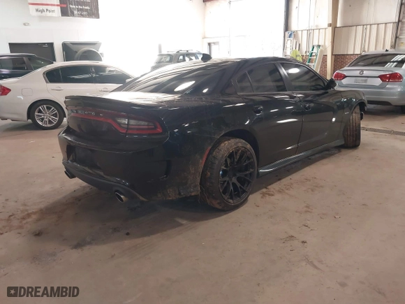 2018 Dodge Charger R/T with VIN 2C3CDXCT1JH340131, listed as a IAAI auction lot 41241332 with 63,801 mi miles. Bid and sale history available at carsss.com. Image 4.