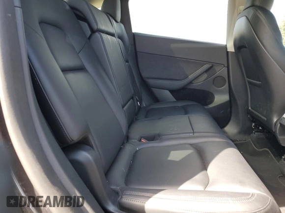 2024 Tesla Model Y Long Range with VIN 7SAYGAEE8RF987571, listed as a Copart auction lot 55110485 with 19,732 mi miles and Salvage title. Bid and sale history available at DreamBid. Image 11.