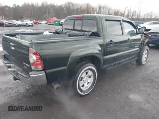 2013 Toyota Tacoma with VIN 3TMLU4EN3DM123470, listed as a IAAI auction lot 41952721 with 72,296 mi miles and . Bid and sale history available at DreamBid. Image 4.