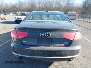 2011 Audi A8 с VIN WAUAVAFDXBN025061, выставлен на аукционе IAAI как лот 41326516 с пробегом 198 850 миль миль и . История ставок и продаж доступна на DreamBid. Изображение 16.