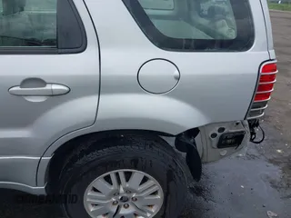 2006 Mercury Mariner Convenience with VIN 4M2YU56Z56KJ00550, listed as a IAAI auction lot 42214907 with 183,671 mi miles and . Bid and sale history available at DreamBid. Image 6.