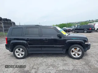 2015 Jeep Patriot Sport with VIN 1C4NJRBB1FD121420, listed as a IAAI auction lot 42344487 with 124,288 mi miles and . Bid and sale history available at DreamBid. Image 14.
