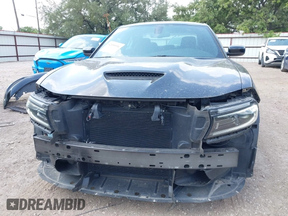 2023 Dodge Charger GT with VIN 2C3CDXHG1PH529771, listed as a IAAI auction lot 42159336 with 55,162 mi miles and . Bid and sale history available at DreamBid. Image 6.