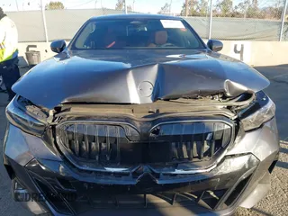 2024 BMW i5 eDrive40 with VIN WBY33FK09RCR42126, listed as a IAAI auction lot 41370577 with 9,601 mi miles and . Bid and sale history available at DreamBid. Image 12.