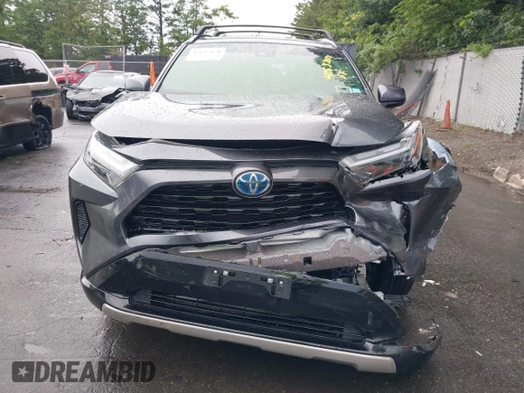 2022 Toyota RAV4 Hybrid SE with VIN JTM16RFV7ND067284, listed as a IAAI auction lot 42637821 with 20,512 mi miles and . Bid and sale history available at DreamBid. Image 12.