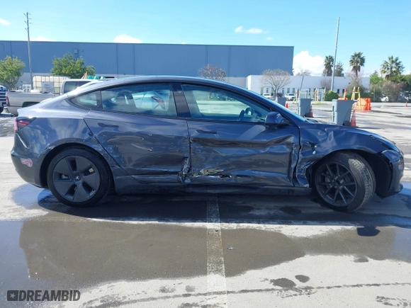2023 Tesla Model 3 with VIN 5YJ3E1EA0PF698076, listed as a IAAI auction lot 41744362 with 12,838 mi miles. Bid and sale history available at carsss.com. Image 14.