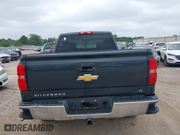 2018 Chevrolet Silverado 1500 LT with VIN 1GCRCREC9JZ105218, listed as a IAAI auction lot 40778682 with 124,621 mi miles and . Bid and sale history available at DreamBid. Image 16.