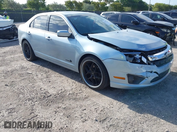 2010 Ford Fusion Hybrid with VIN 3FADP0L35AR354431, listed as a IAAI auction lot 42107722 with 142,250 mi miles. Bid and sale history available at carsss.com. Image 1.