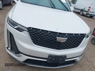 2020 Cadillac XT6 FWD Premium Luxury z VIN 1GYKPCRS2LZ101061, wystawiony jako IAAI lot #42113360 z przebiegiem Nie podano mil oraz . Historia ofert i sprzedaży dostępna na DreamBid. Obrazek 12.