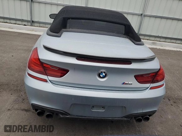2014 BMW M6 z VIN WBSLZ9C56EDZ78719, wystawiony jako Copart lot #42445545 z przebiegiem 63 691 mil mil oraz Szkoda całkowita • Salvage title. Historia ofert i sprzedaży dostępna na DreamBid. Obrazek 6.