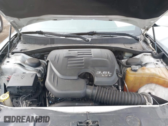 2013 Dodge Charger SE with VIN 2C3CDXBG1DH742921, listed as a IAAI auction lot 41765001 with 196,783 mi miles and . Bid and sale history available at DreamBid. Image 10.