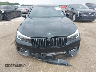 2017 BMW 7 Series 740i z VIN WBA7E2C36HG741092, wystawiony jako IAAI lot #42029625 z przebiegiem 60 389 mil mil oraz . Historia ofert i sprzedaży dostępna na DreamBid. Obrazek 6.
