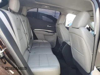 2020 Cadillac XT4 FWD Luxury z VIN 1GYAZAR40LF059910, wystawiony jako Copart lot #55426065 z przebiegiem 36 590 mil mil oraz Szkody całkowita. Historia ofert i sprzedaży dostępna na DreamBid. Obrazek 11.