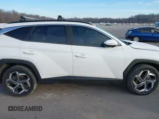 2022 Hyundai Tucson SEL with VIN 5NMJCCAE7NH158933, listed as a IAAI auction lot 41531628 with 57,996 mi miles and . Bid and sale history available at DreamBid. Image 13.