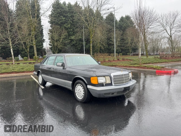 1988 Mercedes-Benz 560 with VIN WDBCA39D1JA406073, listed as a Copart auction lot 50398345 with 111,524 mi miles and Clean Title. Bid and sale history available at DreamBid. Image 1.
