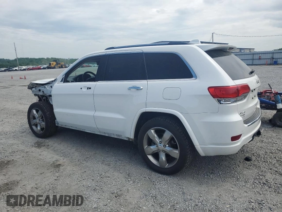 2017 Jeep Grand Cherokee Overland with VIN 1C4RJFCT7HC734125, listed as a Copart auction lot 54333215 with 101,229 mi miles and Salvage title. Bid and sale history available at DreamBid. Image 2.