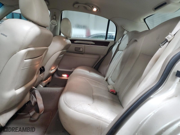 2003 Lincoln Town Car Cartier with VIN 1LNHM83W53Y623587, listed as a Copart auction lot 83599884 with 127,729 mi miles and Salvage Title. Bid and sale history available at carsss.com. Image 10.
