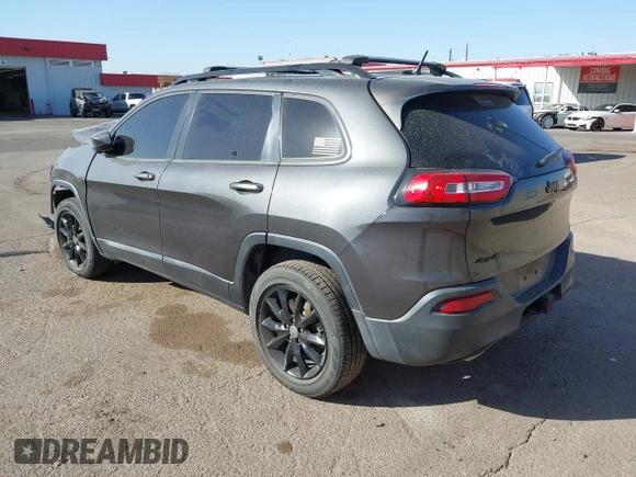 2014 Jeep Cherokee Latitude with VIN 1C4PJMCBXEW317384, listed as a IAAI auction lot 41621635 with 180,971 mi miles and . Bid and sale history available at DreamBid. Image 3.