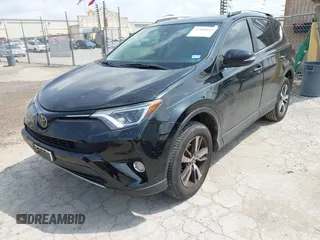 2018 Toyota RAV4 XLE z VIN 2T3WFREV4JW495379, wystawiony jako IAAI lot #42406849 z przebiegiem 132 126 mil mil oraz . Historia ofert i sprzedaży dostępna na DreamBid. Obrazek 18.