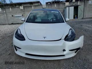 2023 Tesla Model 3 z VIN 5YJ3E1EAXPF422956, wystawiony jako Copart lot #52500285 z przebiegiem 24 082 mil mil oraz Nie do naprawy • Non repairable. Historia ofert i sprzedaży dostępna na DreamBid. Obrazek 5.