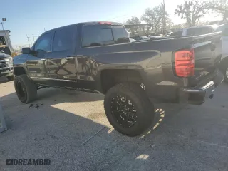 2014 Chevrolet Silverado 1500 LTZ with VIN 1GCUKSECXEF193272, listed as a Copart auction lot 82775984 with 154,131 mi miles and Salvage Title. Bid and sale history available at carsss.com. Image 2.