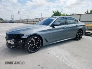 2022 BMW 5 Series 530i z VIN WBA53BH00NWX59634, wystawiony jako Copart lot #61598505 z przebiegiem 69 130 mil mil oraz Szkoda całkowita • Salvage title. Historia ofert i sprzedaży dostępna na DreamBid. Obrazek 1.