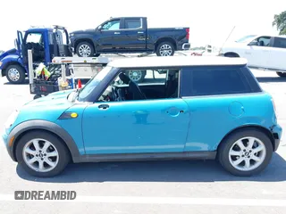 2007 MINI Hardtop with VIN WMWMF335X7TT54929, listed as a IAAI auction lot 42173757 with 71,496 mi miles and . Bid and sale history available at DreamBid. Image 15.