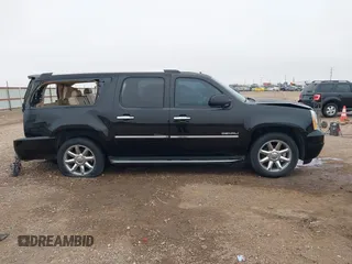 2014 GMC Yukon XL Denali with VIN 1GKS2MEF8ER239777, listed as a IAAI auction lot 41192009 with 142,656 mi miles. Bid and sale history available at carsss.com. Image 14.