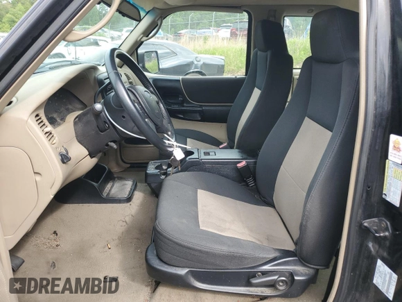 2006 Ford Ranger XL z VIN 1FTYR14U06PA74952, wystawiony jako Copart lot #57970005 z przebiegiem 147 886 mil mil oraz Czysty tytuł • Clean title. Historia ofert i sprzedaży dostępna na DreamBid. Obrazek 7.