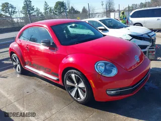 2012 Volkswagen Beetle 2.0T Turbo w/Sun/Sound with VIN 3VWV67ATXCM650376, listed as a IAAI auction lot 41315431 with 104,523 mi miles. Bid and sale history available at carsss.com. Image 1.