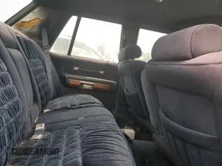 1991 Mercury Grand Marquis z VIN 2MECM75F9MX641760, wystawiony jako Copart lot #59421315 z przebiegiem 47 764 mil mil oraz Czysty tytuł • Clean title. Historia ofert i sprzedaży dostępna na DreamBid. Obrazek 10.