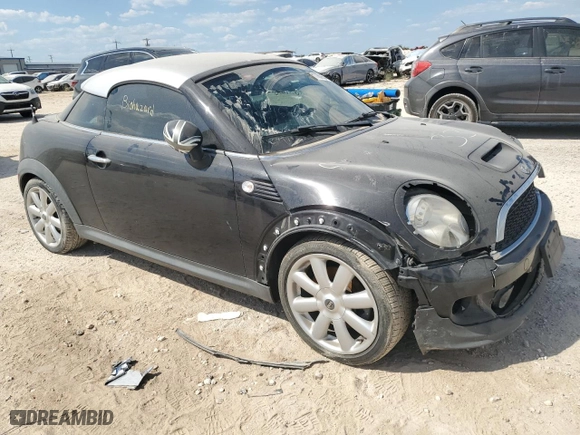 2012 MINI Cooper Coupe S with VIN WMWSX3C53CT154716, listed as a Copart auction lot 71780654 with 101260 miles and Salvage Title. Bid and sale history available at carsss.com. Image 4.