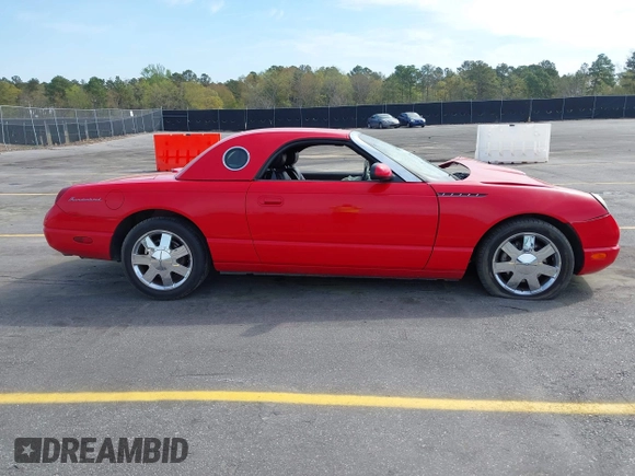 2002 Ford Thunderbird Hardtop Premium with VIN 1FAHP60A02Y130882, listed as a IAAI auction lot 41911737 with 18,521 mi miles and . Bid and sale history available at DreamBid. Image 14.
