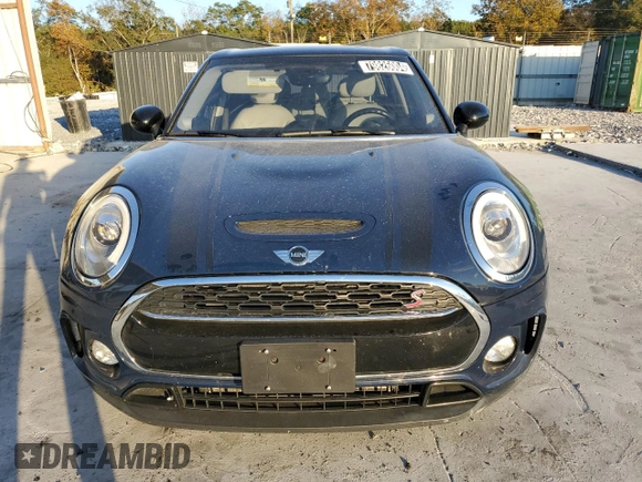 2017 MINI Clubman Cooper S with VIN WMWLU5C56H2E82110, listed as a Copart auction lot 79826004 with 82,756 mi miles and Clean Title. Bid and sale history available at carsss.com. Image 5.
