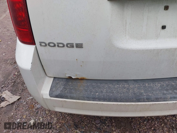 2010 Dodge Grand Caravan SXT with VIN 2D4RN5D17AR408112, listed as a IAAI auction lot 42128842 with 173,862 mi miles and . Bid and sale history available at DreamBid. Image 15.