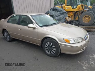 2000 Toyota Camry CE z VIN JT2BG22K1Y0407991, wystawiony jako IAAI lot #42377290 z przebiegiem 180 736 mil mil oraz . Historia ofert i sprzedaży dostępna na DreamBid. Obrazek 1.