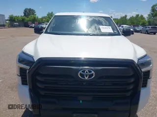 2022 Toyota Tundra with VIN 5TFKB5CDXNX001458, listed as a IAAI auction lot 42640278 with 51,718 mi miles and . Bid and sale history available at DreamBid. Image 12.