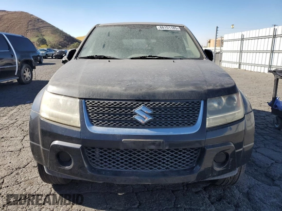 2009 Suzuki Grand Vitara z VIN JS3TD042294100363, wystawiony jako Copart lot #88151185 z przebiegiem 86 595 mil mil oraz Czysty tytuł • Clean title. Historia ofert i sprzedaży dostępna na DreamBid. Obrazek 5.